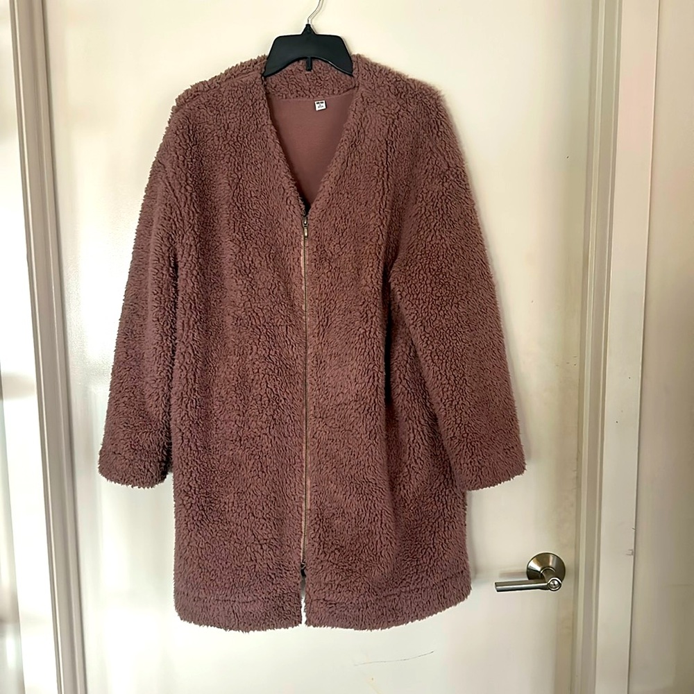 Like new. Super warm and cozy coat